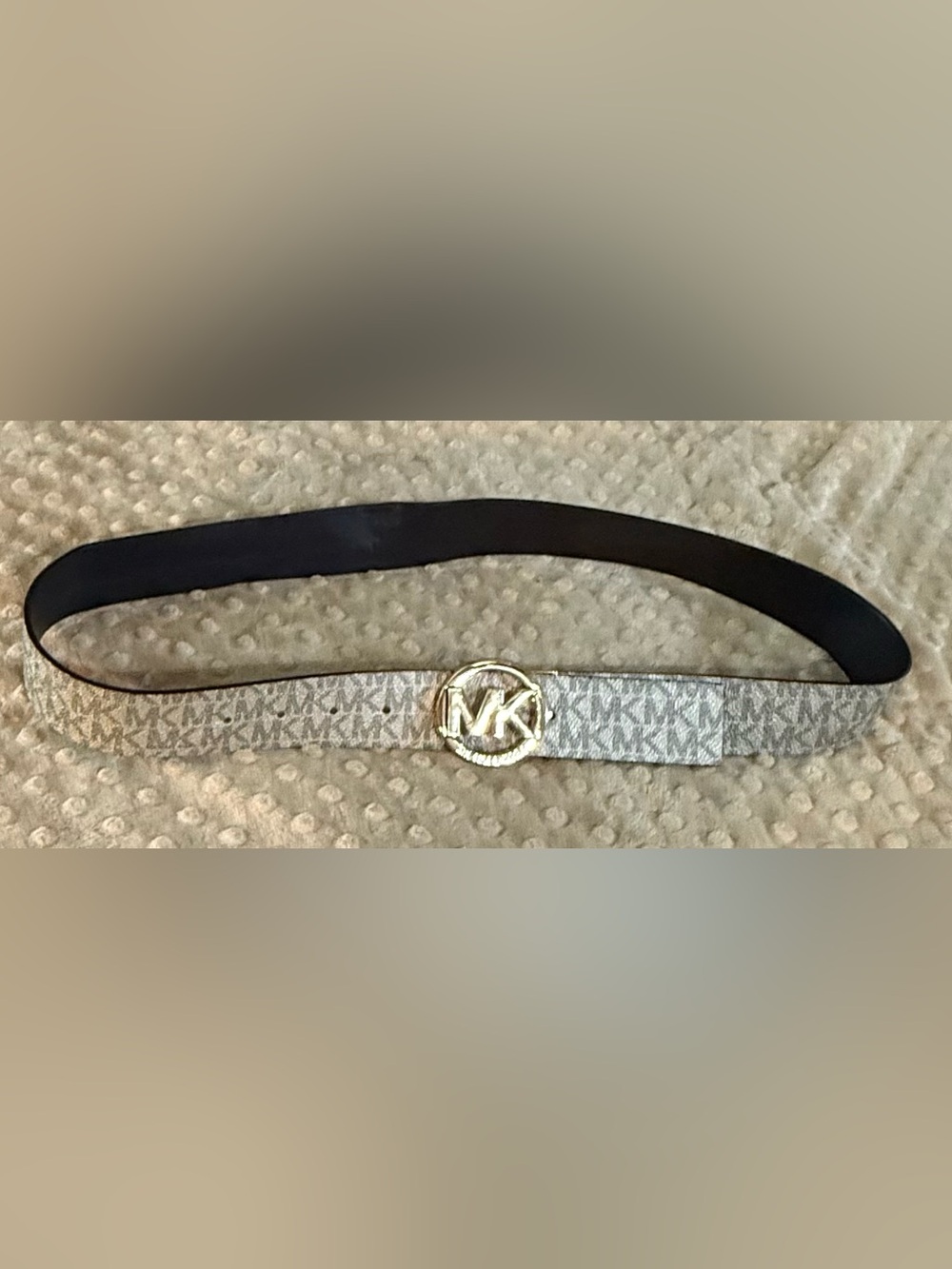 Michael Kors Black and Gold reversible belt.